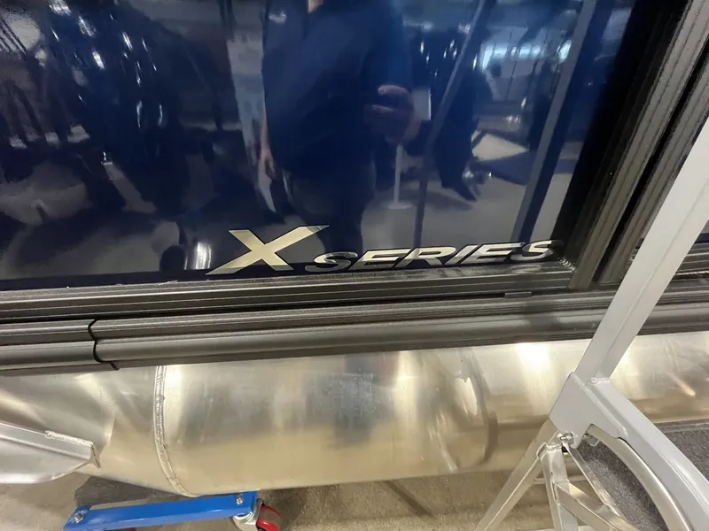 Slide: The Image of Close-up of Sylvan X3 LZ DH with shiny metal and X Series logo. - 22