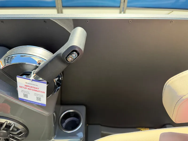 Slide: The Image of Close-up of a 2027 Sylvan X3 ULZ helm with throttle lever and cup holder. - 22