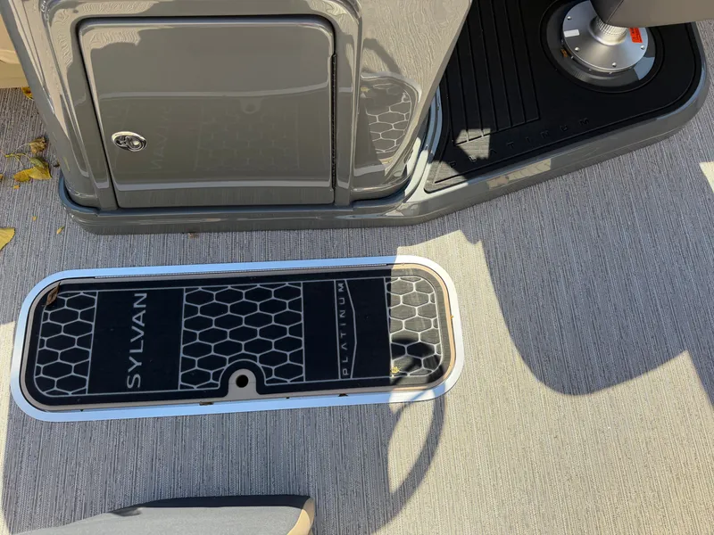 Slide: The Image of Floor view of a 2027 Sylvan X3 ULZ with stylish design and platinum logo. - 14