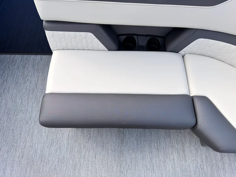 Slide: The Image of The 2027 Sylvan Q-20 Party Fish features a sleek bench seat with two-tone upholstery and cup holders. - 17