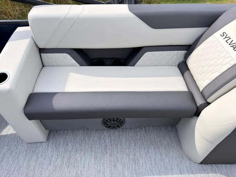 Slide: The Image of The 2027 Sylvan Q-20 Party Fish features a stylish, cushioned bench seat with an integrated speaker. - 45