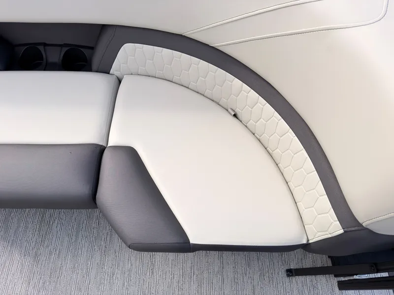 Slide: The Image of Elegant white and gray upholstery with a honeycomb pattern on a Sylvan Q-20 Party Fish boat. - 15