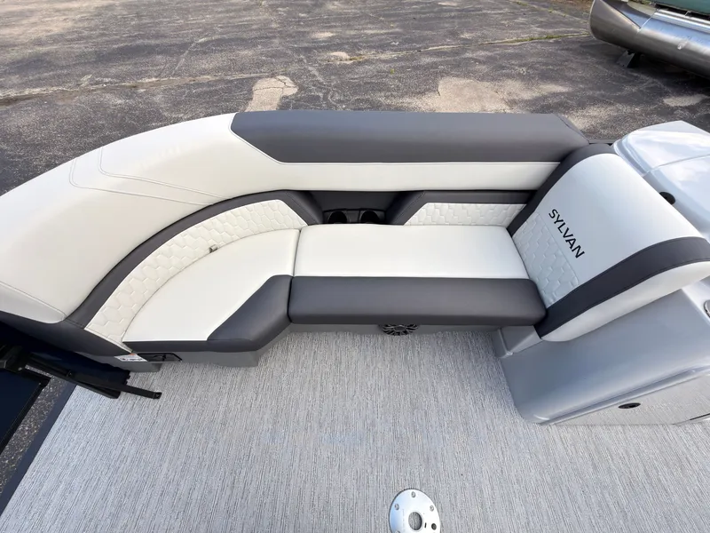 Slide: The Image of The 2027 Sylvan Q-20 Party Fish features a sleek, cushioned bench seat in white and gray. - 20