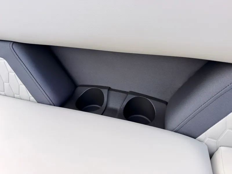 Slide: The Image of Close-up of cup holders in a modern boat with gray and white upholstery. - 19