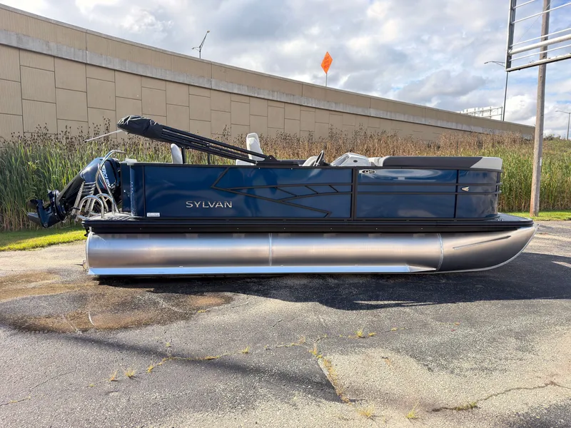 The Image of A modern pontoon boat by Sylvan, model Q-20 Party Fish, year 2027, parked on a lot. - 0