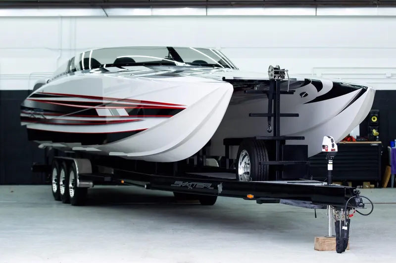 Slide: The Image of 2020 Skater 368 powerboat on trailer in a garage setting. - 5