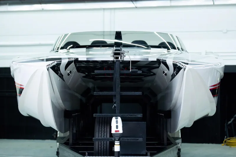 Slide: The Image of 2020 Skater 368 powerboat on trailer, showcasing sleek design and aerodynamic features. - 10