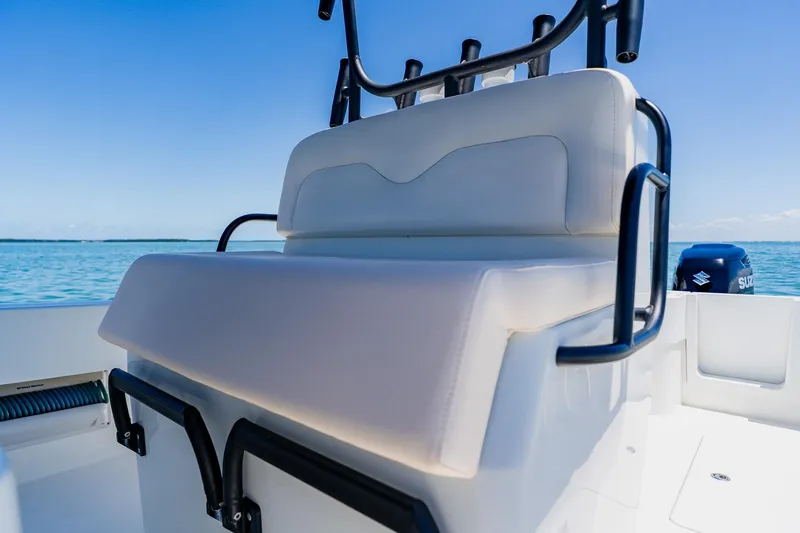 Slide: The Image of 2016 Andros 32 Offshore boat seat with ocean backdrop. - 53
