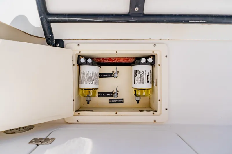Slide: The Image of Fuel filter compartment on a 2016 Andros 32 Offshore boat. - 90