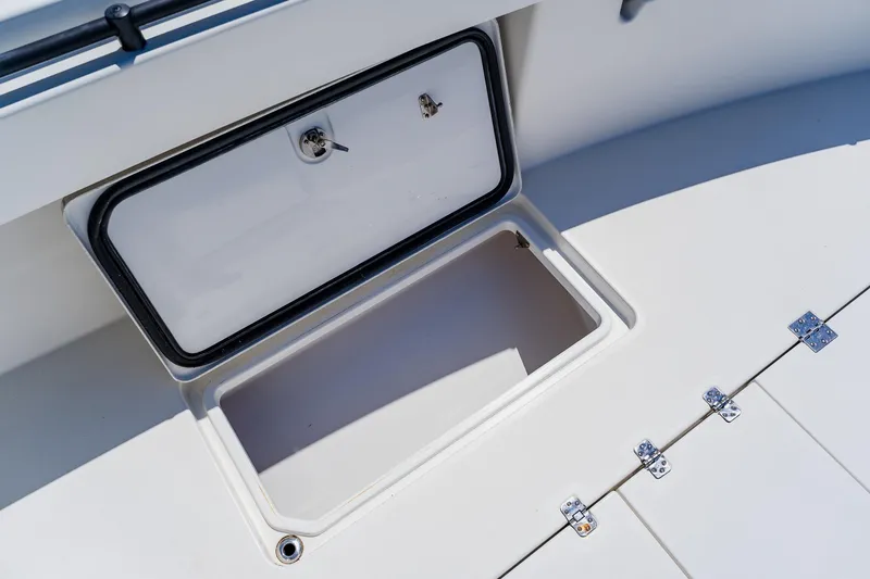 Slide: The Image of Open storage compartment on 2016 Andros 32 Offshore boat deck. - 31