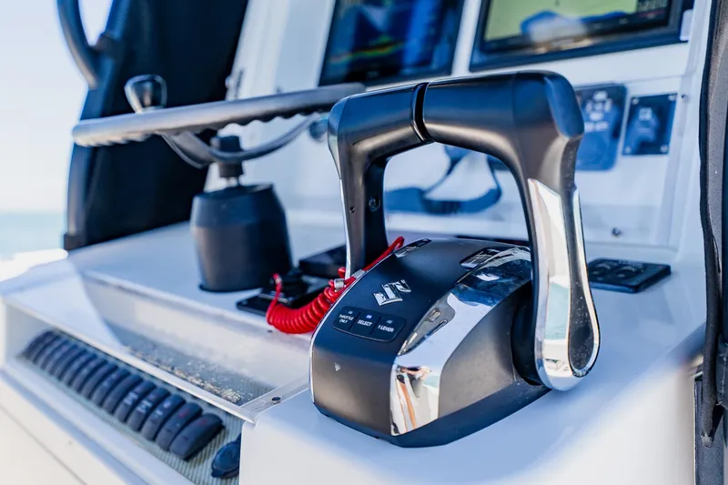 Slide: The Image of Close-up of 2016 Andros 32 Offshore boat controls and dashboard. - 50