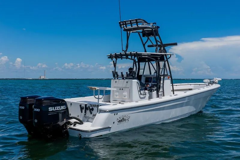 The Image of 2016 Andros 32 Offshore boat with dual Suzuki engines on open water. - 4