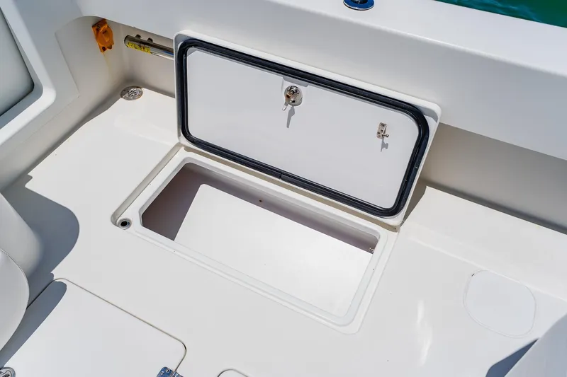 Slide: The Image of Storage compartment on a 2016 Andros 32 Offshore boat, open and ready for use. - 71
