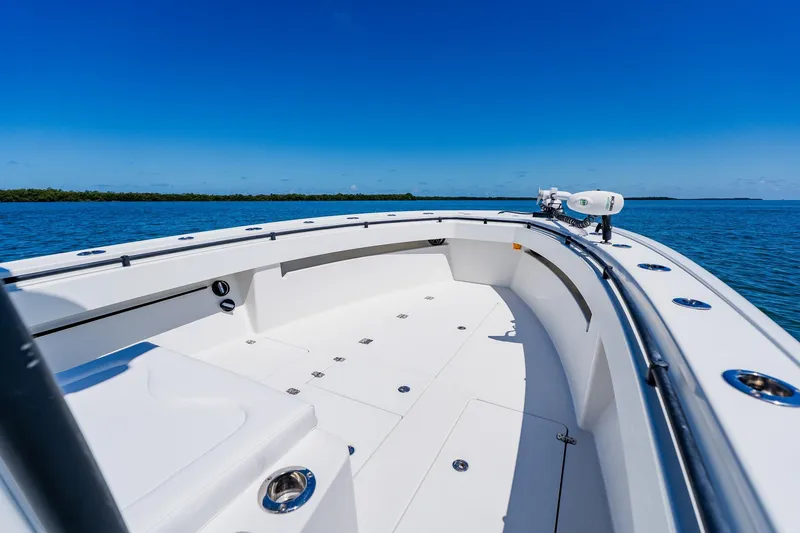 Slide: The Image of 2016 Andros 32 Offshore boat on calm blue water under clear sky. - 19
