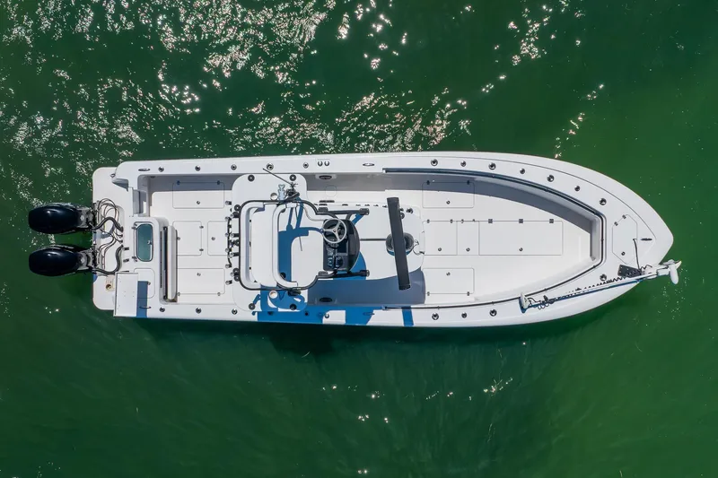Slide: The Image of Aerial view of 2016 Andros 32 Offshore boat on green water. - 12
