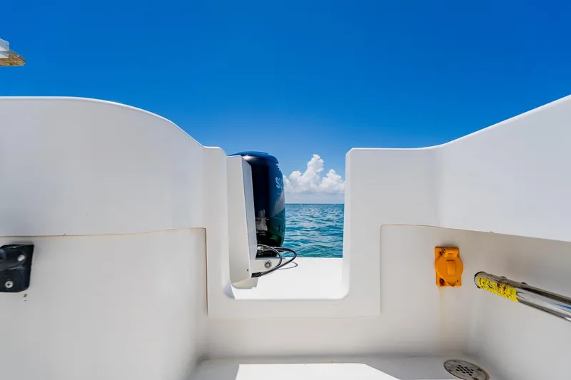 Slide: The Image of 2016 Andros 32 Offshore boat with Suzuki outboard motor, ocean view, clear blue sky. - 65