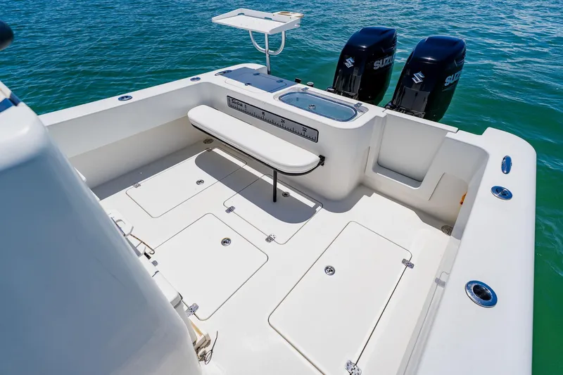Slide: The Image of 2016 Andros 32 Offshore boat deck with dual Suzuki engines, spacious layout, and fishing amenities. - 62
