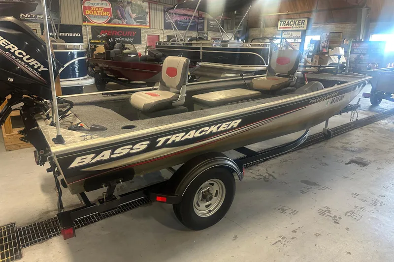 Slide: The Image of 2015 Tracker Panfish 16 boat with Mercury engine in showroom setting. - 4