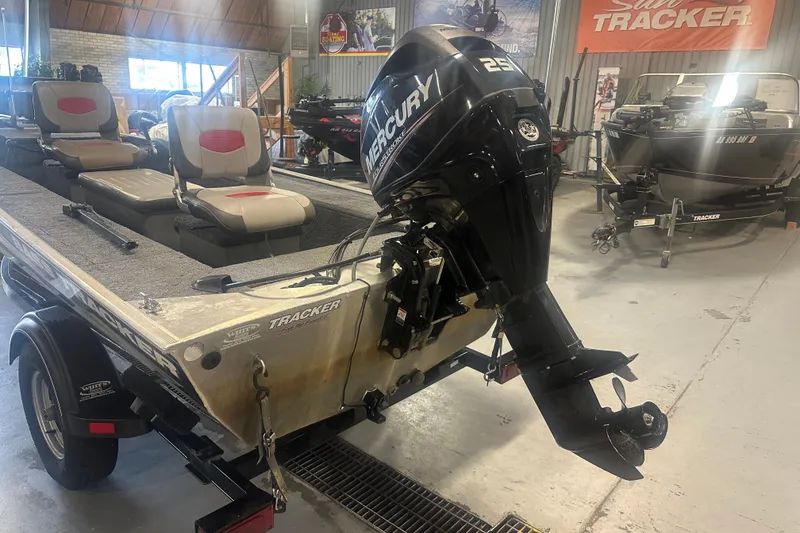 Slide: The Image of 2015 Tracker Panfish 16 boat with Mercury 25 outboard motor in showroom. - 11