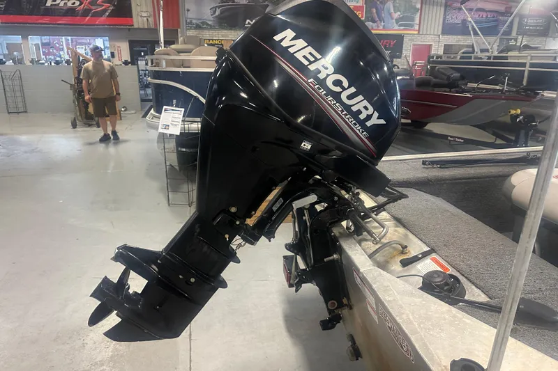 Slide: The Image of 2015 Tracker Panfish 16 boat with Mercury FourStroke outboard motor in showroom. - 10