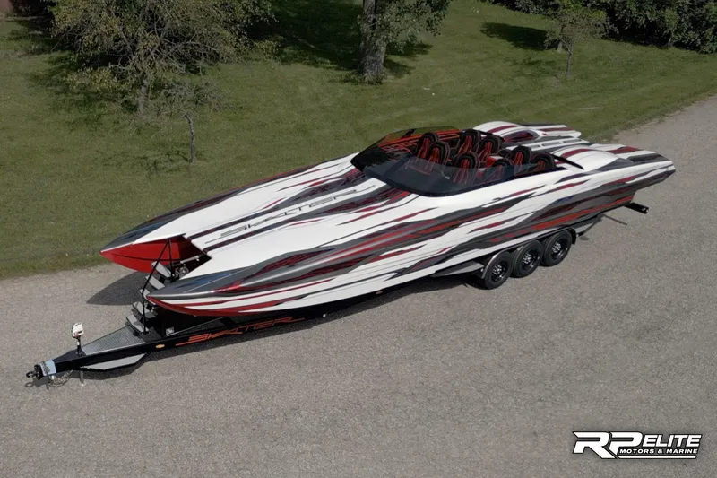Slide: The Image of 2024 Skater 368 powerboat with sleek design on a trailer, featuring bold red and white graphics. - 44