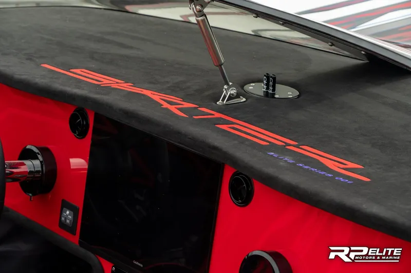 Slide: The Image of Dashboard of 2024 Skater 368 boat with red accents and logo. - 21