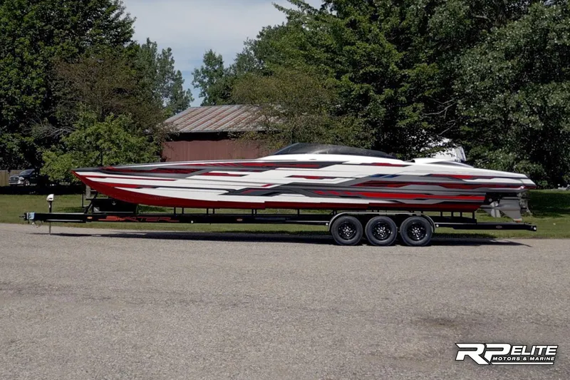 Slide: The Image of 2024 Skater 368 powerboat on trailer, featuring sleek design and vibrant graphics. - 40