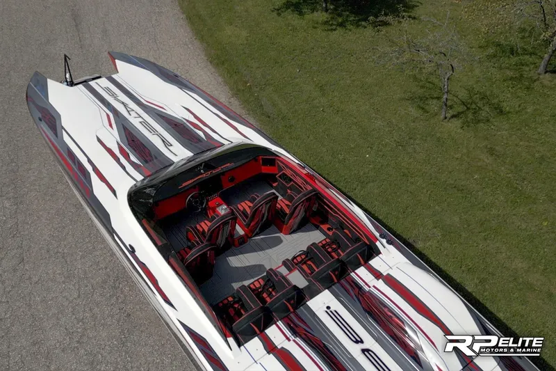 Slide: The Image of Aerial view of 2024 Skater 368 speedboat with sleek red and white design. - 47