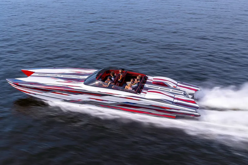 Slide: The Image of 2024 Skater 368 speedboat cruising on water with vibrant red and white design. - 3