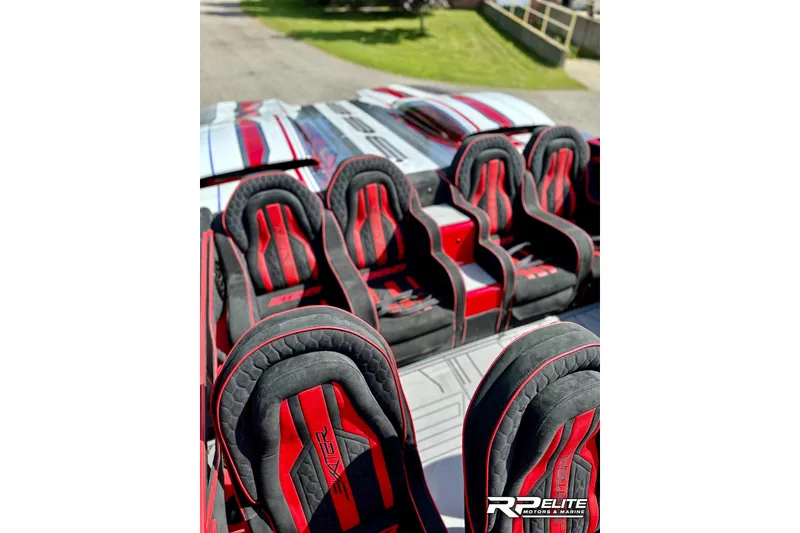 Slide: The Image of Red and black seats in a 2024 Skater 368 boat, showcasing sporty design. - 20