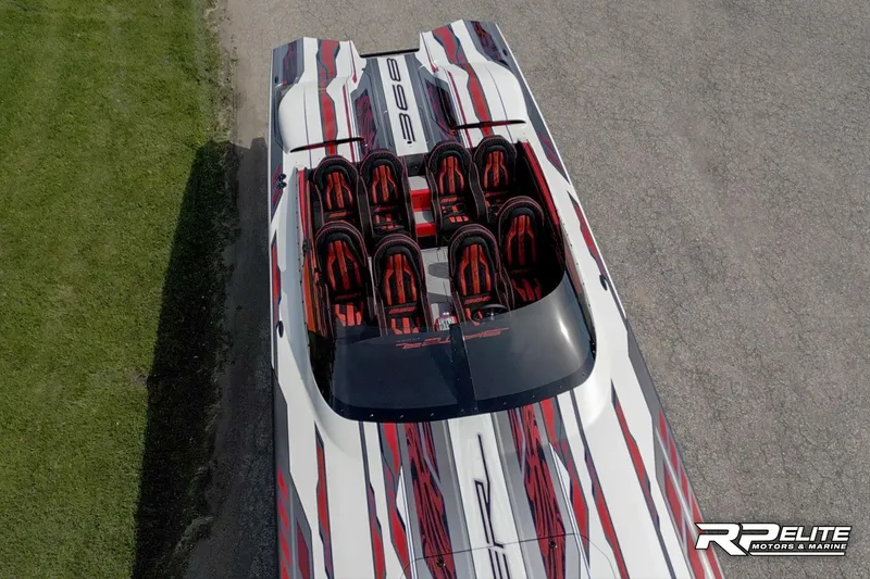Slide: The Image of Aerial view of 2024 Skater 368 speedboat with striking red and white design. - 46