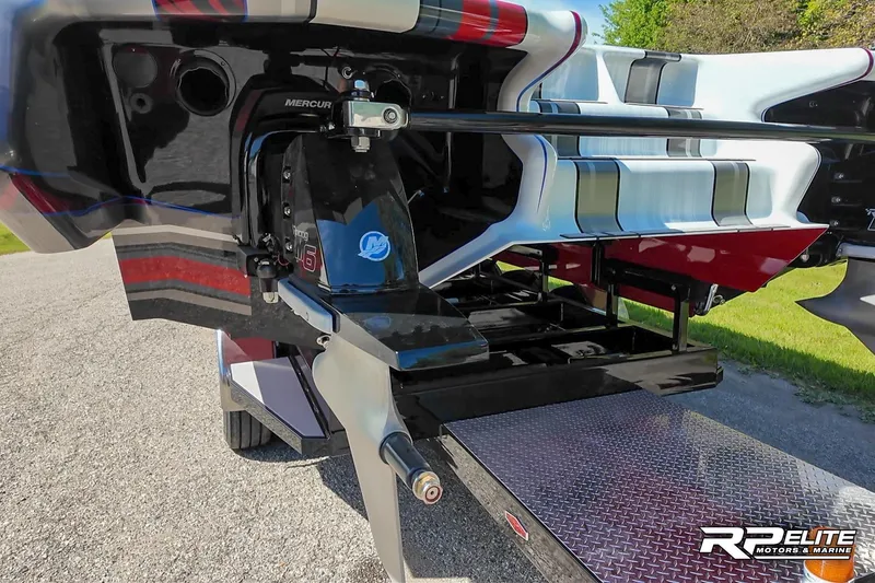 Slide: The Image of 2024 Skater 368 boat with Mercury engine on a trailer, featuring sleek design and vibrant colors. - 36