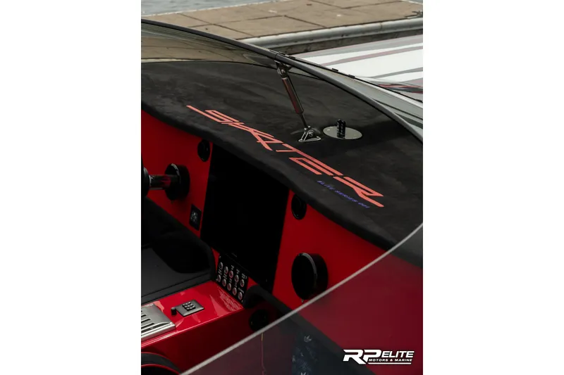 Slide: The Image of Interior view of 2024 Skater 368 boat dashboard with sleek design and controls. - 22