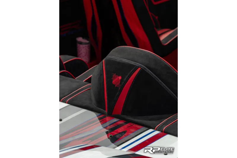 Slide: The Image of 2024 Skater 368 interior with black and red upholstery, featuring sleek design and logo detailing. - 25