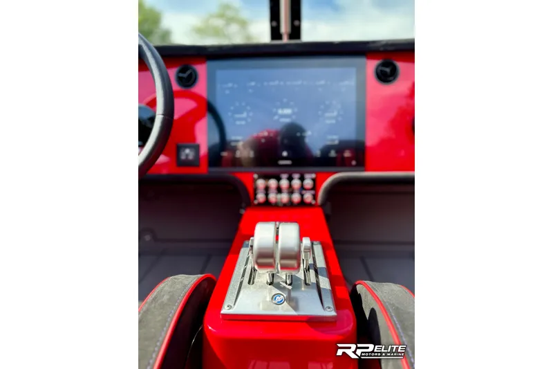 Slide: The Image of Red Skater 368 boat dashboard with modern controls and touchscreen, 2024 model. - 15
