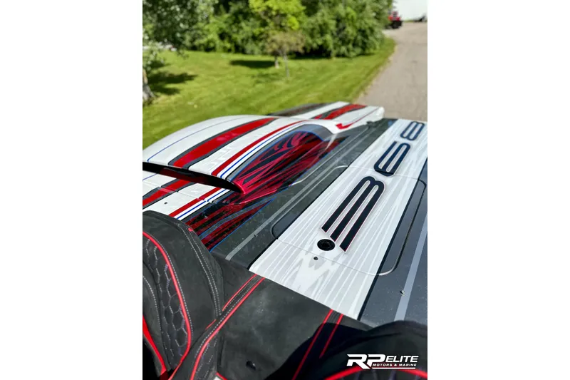 Slide: The Image of 2024 Skater 368 boat with sleek design and vibrant red accents. - 31