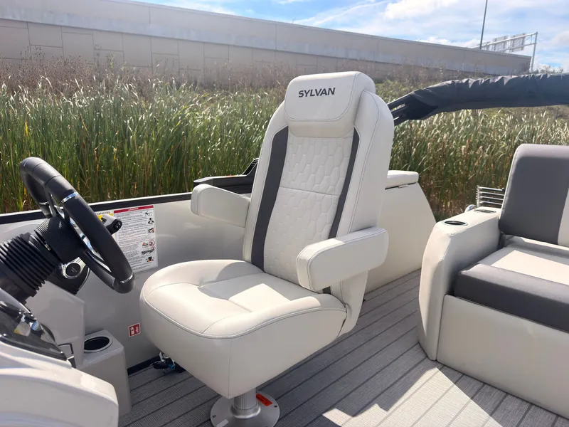 Slide: The Image of A modern boat with a comfortable, padded captain's chair and a helm station. - 29