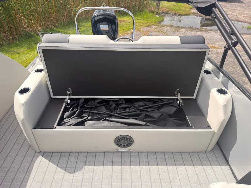 Slide: The Image of The 2027 Sylvan Q-22 ULZ features an open bench seat with storage underneath. - 43