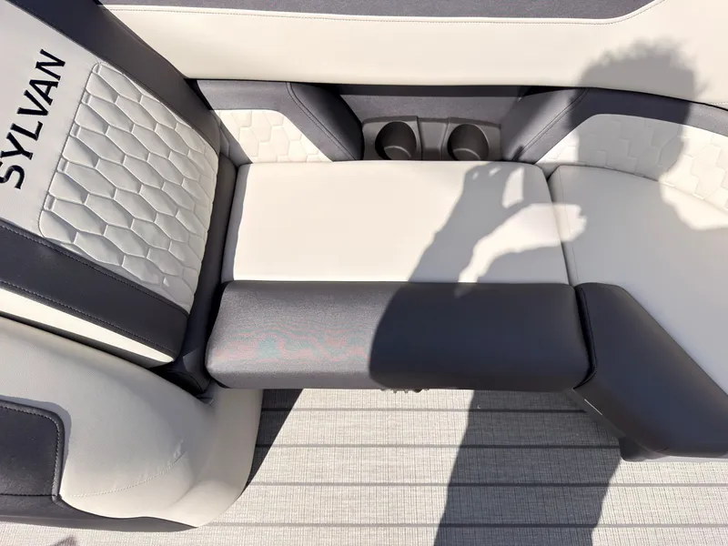 Slide: The Image of The 2027 Sylvan Q-22 ULZ features a stylish bench seat with two-tone upholstery and cup holders. - 20