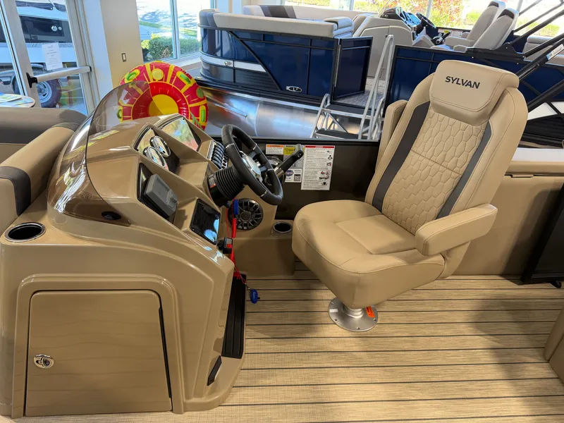 Slide: The Image of The image shows the cockpit of a 2027 Sylvan Q-22 ULZ with a beige captain's chair. - 16