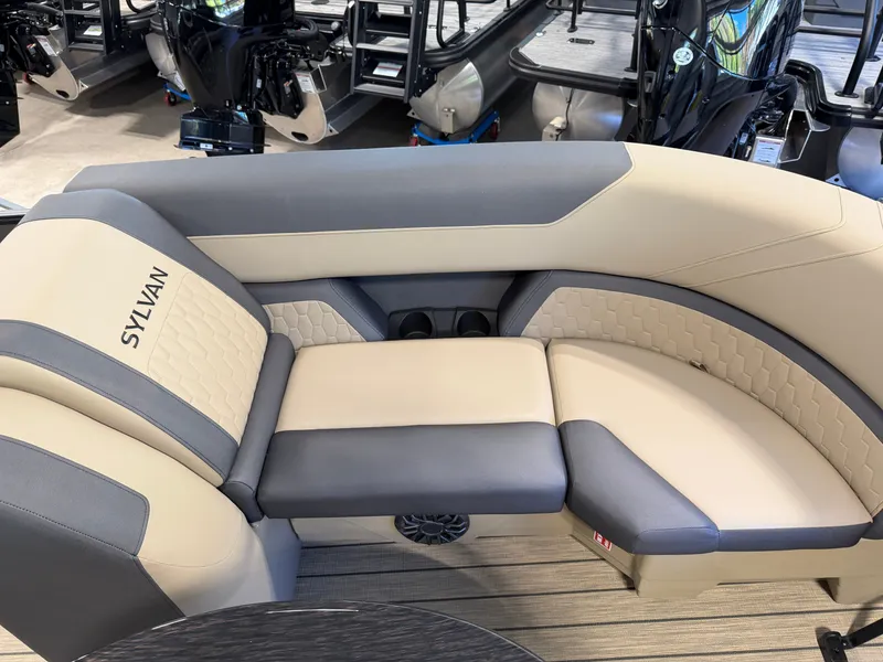 Slide: The Image of The image shows a luxurious, upholstered seating area in a modern boat. - 6