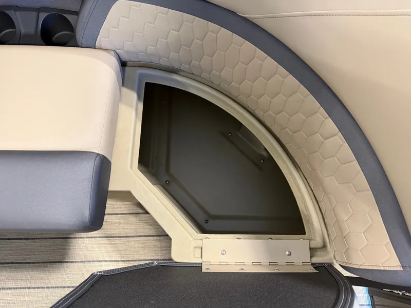 Slide: The Image of Close-up of a seating area with padded leather and honeycomb pattern on a Sylvan Q-22 ULZ boat. - 8