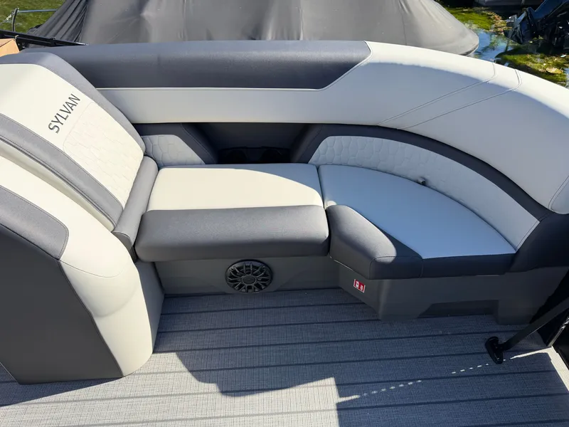 Slide: The Image of The 2027 Sylvan Q-22 LZ features an elegant, cushioned bench seat with gray and white accents. - 25