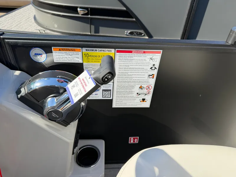 Slide: The Image of Close-up of a 2027 Sylvan Q-22 LZ helm with warning labels and capacity information. - 19