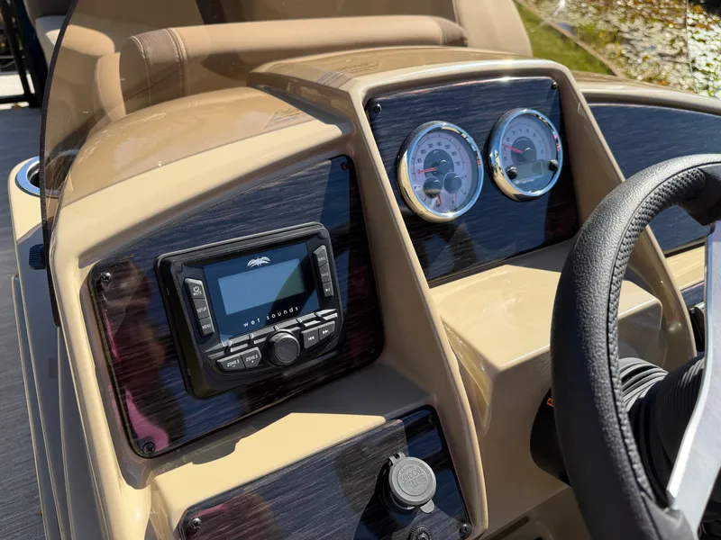 Slide: The Image of The dashboard of a 2027 Sylvan MIRAGE 822 CLZ DH with modern gauges and controls. - 17