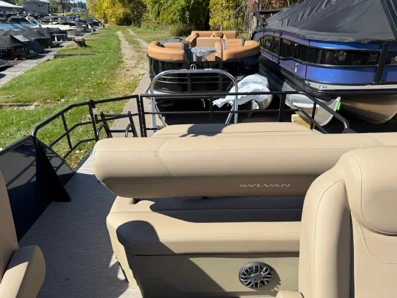 Slide: The Image of 2027 Sylvan MIRAGE 822 CLZ DH with beige seats and black railing. - 24