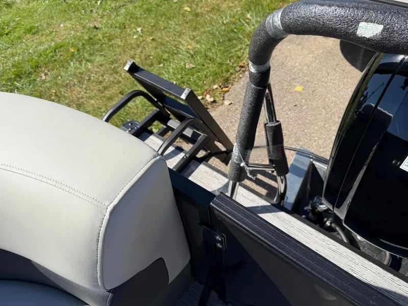 Slide: The Image of The image shows the rear of a Sylvan Mirage 822 LZ with a swim ladder. - 26