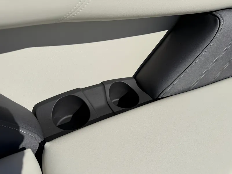 Slide: The Image of Close-up of two cup holders in a Sylvan Mirage 822 LZ boat. - 24