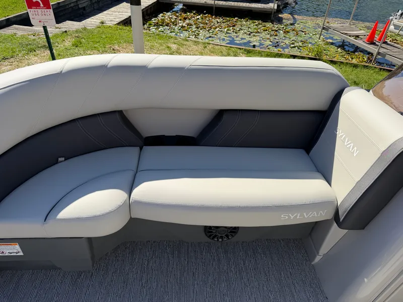 Slide: The Image of Sylvan Mirage 822 LZ 2027: Sleek gray and white seating on a boat. - 5