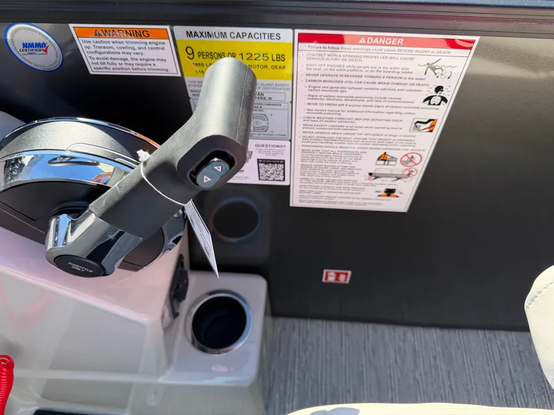 Slide: The Image of Close-up of a Sylvan Mirage 822 LZ helm with warning labels and cup holders. - 18